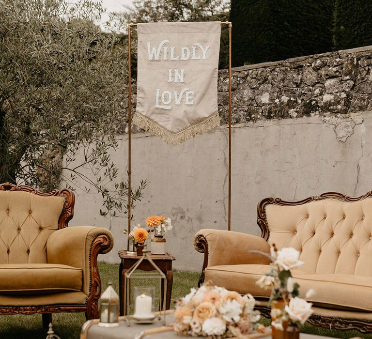 Lounge seating area for outdoor safari wedding 