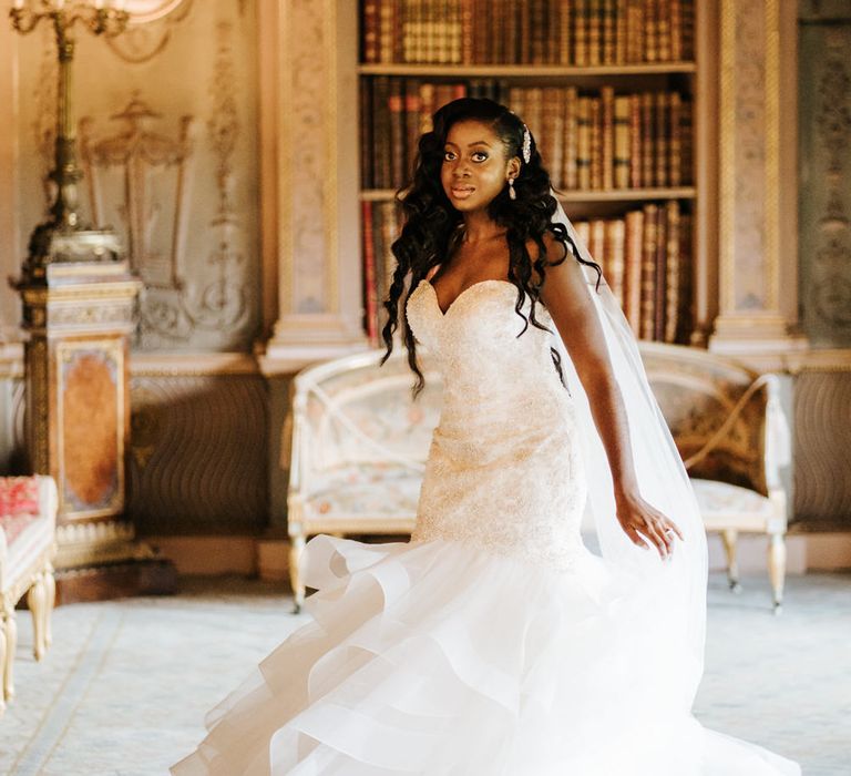 Beautiful black bride in strapless wedding dress with fishtail skirt 