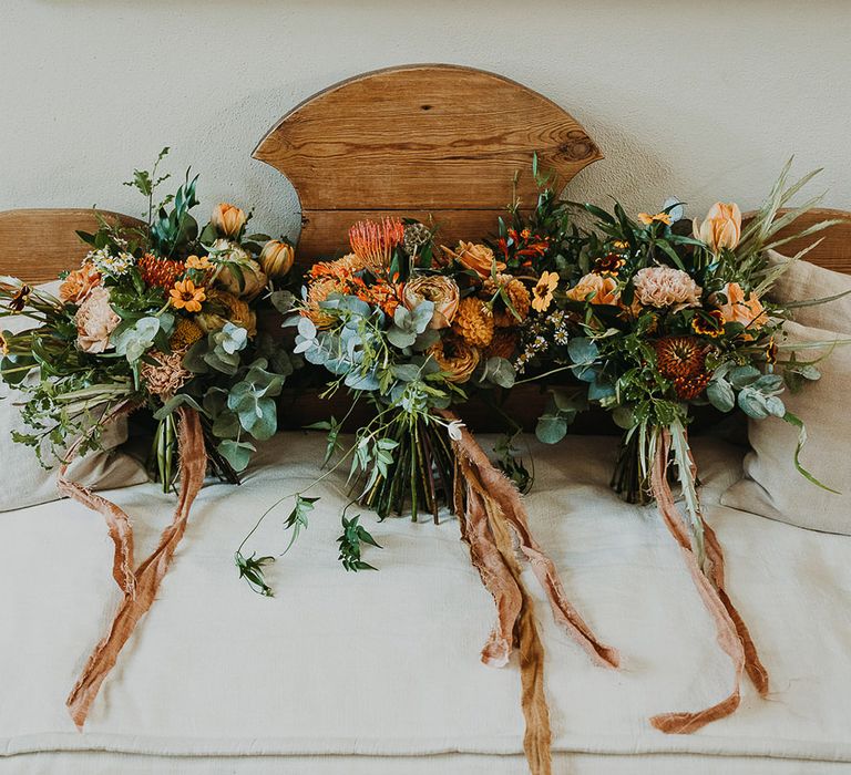 Orange and green wedding bouquets 