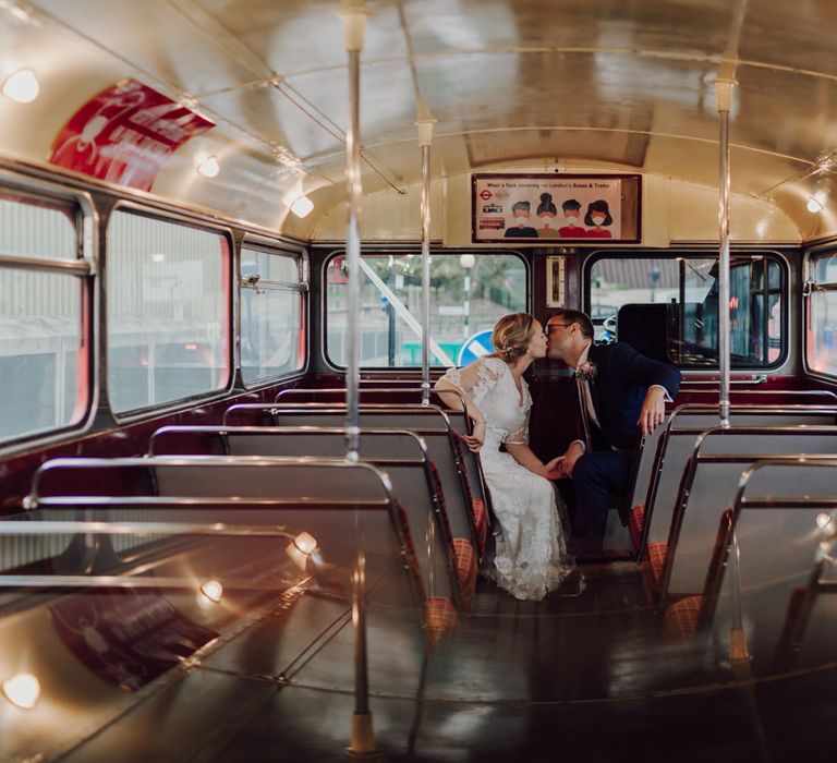 Bride and groom on London bus