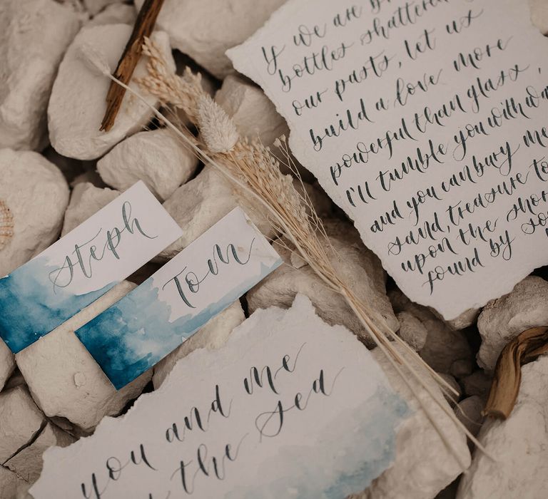 wedding stationery with blue water colours and calligraphy design 