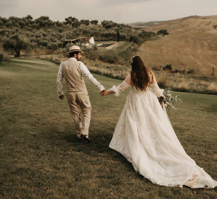 Bride and Groom roam the Tuscany countryside at The Lazy Olive