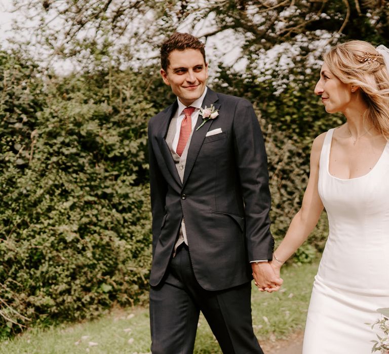 Bride and groom portrait by Sam Cook Photography 