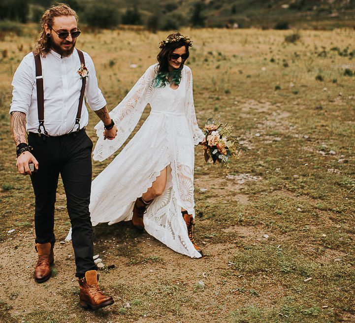 Bride & groom walk together in the Lake District