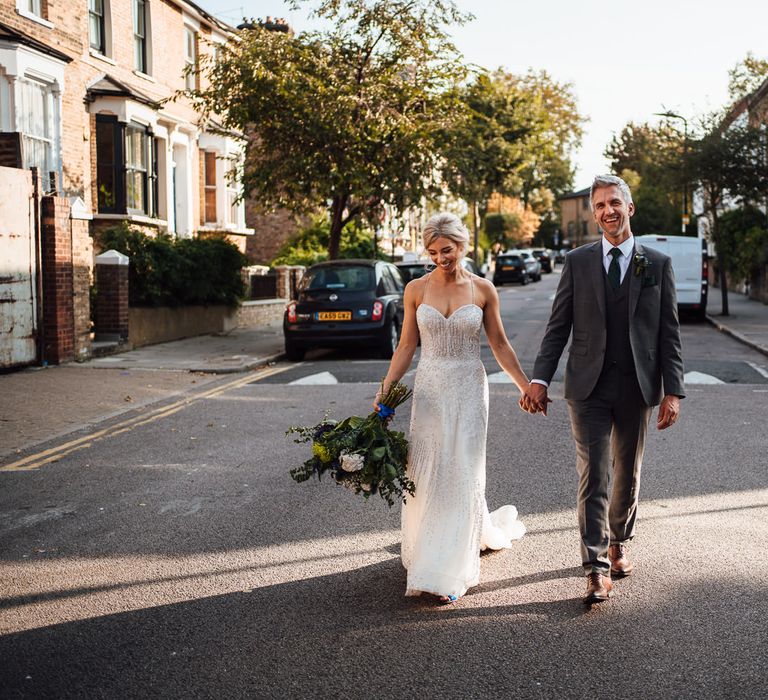 Bride & groom dance through London as they head to their reception venue