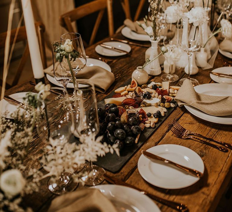 bohemian luxe wedding reception with dried flowers and grazing board 