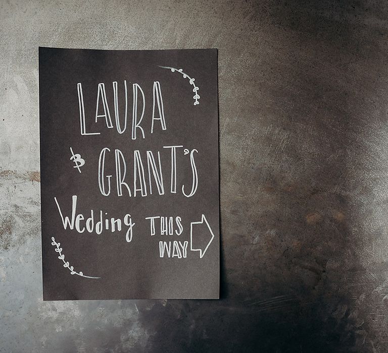 DIY black wedding welcome sign with white ink 