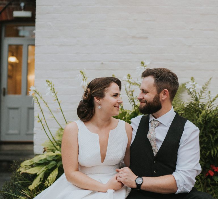 Bride and groom at luxe vintage wedding