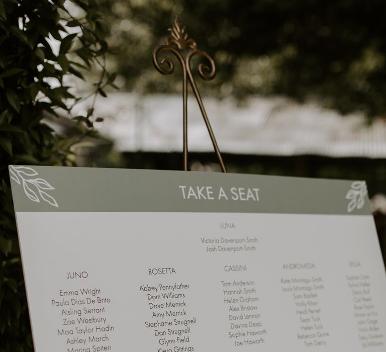 Wedding seating chart with sage green accent colour