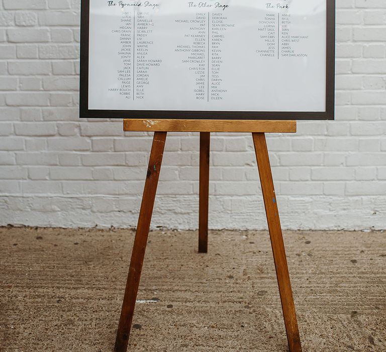 Wedding seating chart with tables named after different stages at Glastonbury festival 