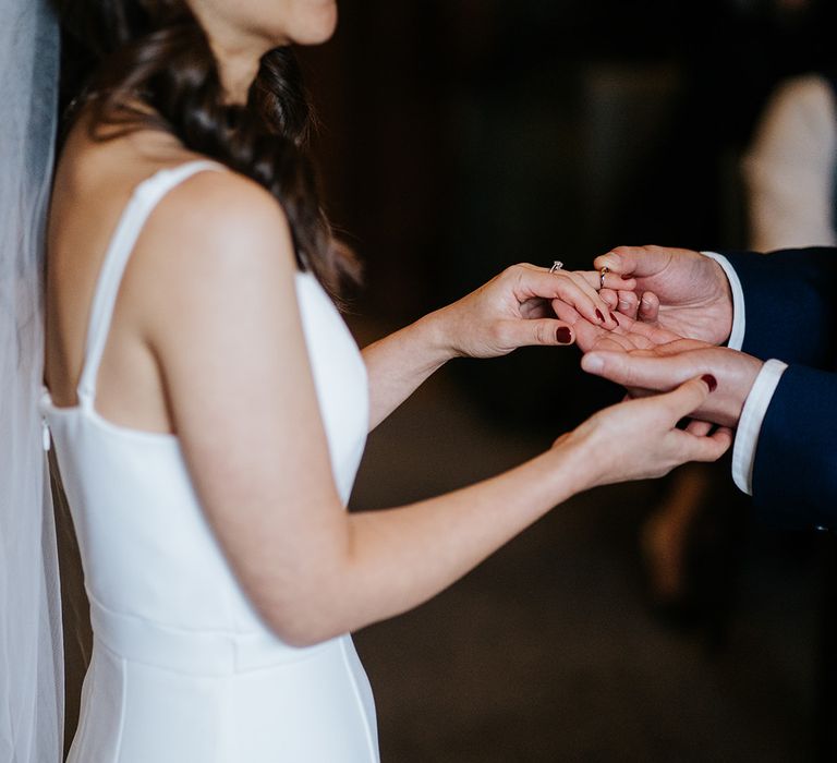 Bride & groom during wedding ceremony at The Old Marylebone Town Hall