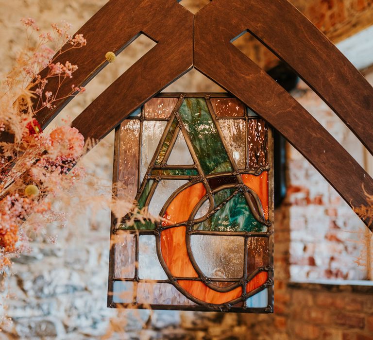 Personalised colourful stained glass decoration at the altar 