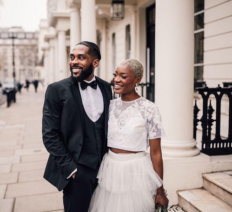 Black Bride and Groom smiling at London wedding shoot