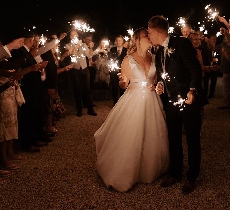 Romantic and magical sparkler send off for the bride and groom at Bake Barn