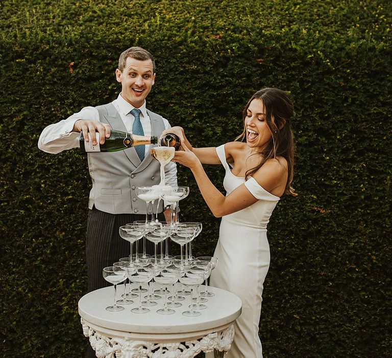 Fun champagne tower wedding photo 