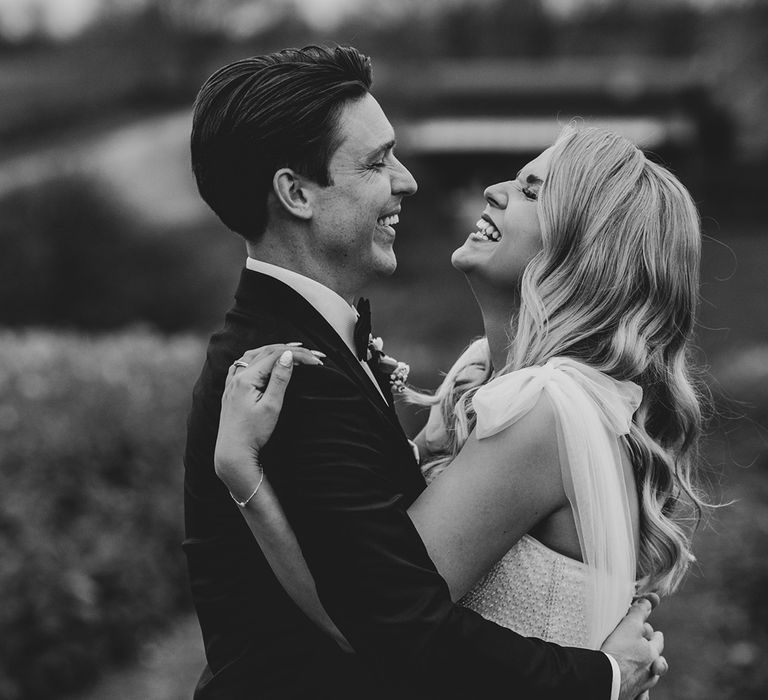 Black and white couple portrait of the bride and groom on their wedding day 