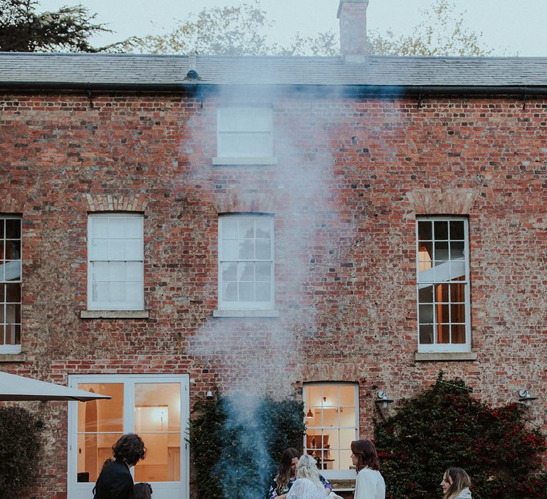 Fire pit at Aswarby Rectory to keep the guest warm at the October autumn wedding 