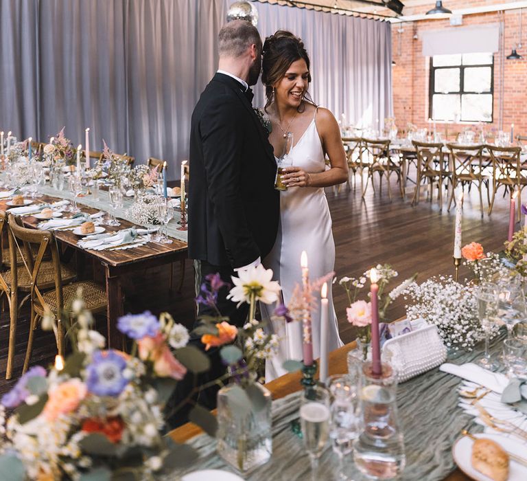 Bowers Mill, The Venue in Halifax Yorkshire wedding venue with the bride and groom in black tie dress code 