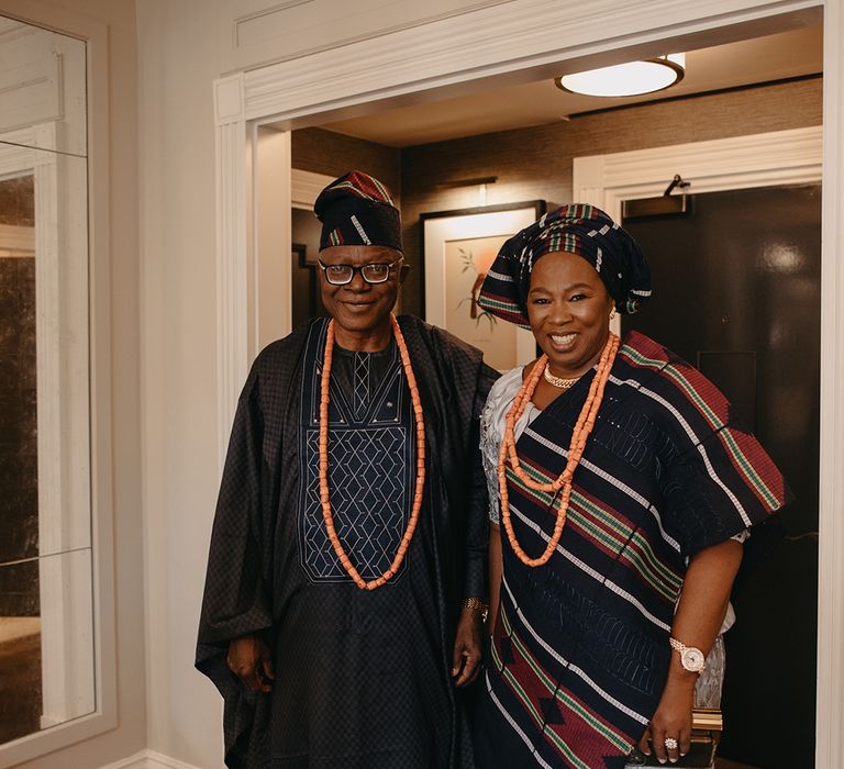 The bride's parents wearing traditional African wedding outfits 