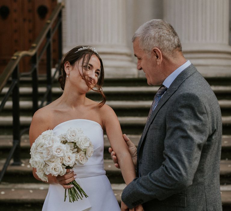 Bride and groom at intimate town hall wedding