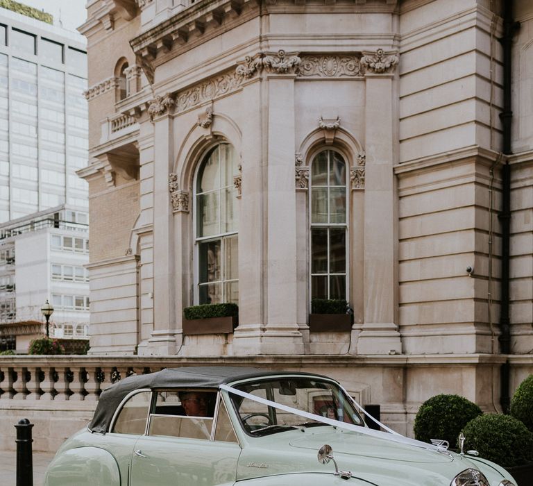 Vintage mint green wedding car