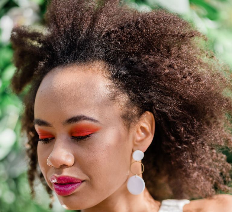 Bride with orange eyeshadow, pink lip and Muted Luxe handmade earrings