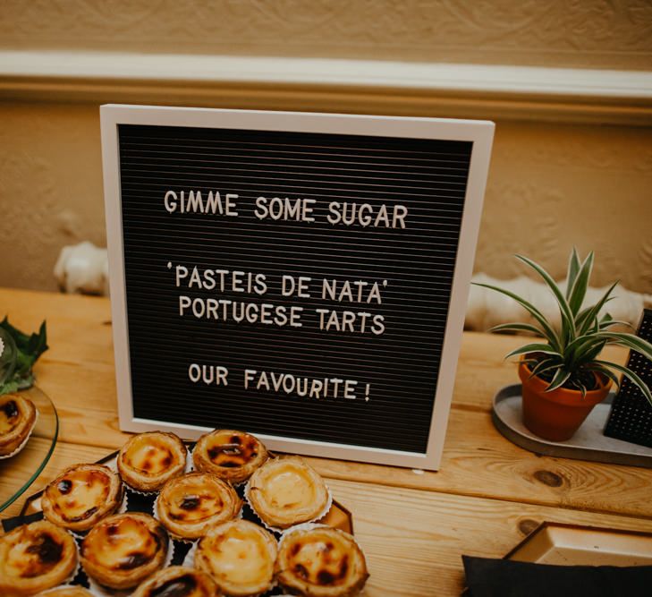 Dessert table with barber board wedding sign 