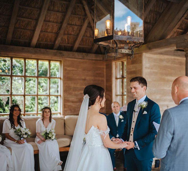 Bride & groom during wedding ceremony at Euridge Manor