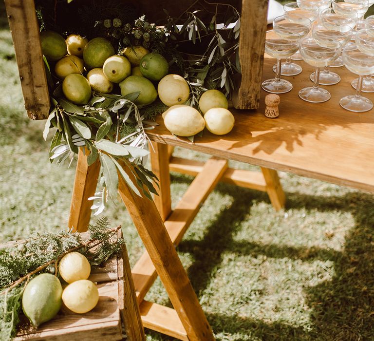 Box of lemons with drinks for the guests 