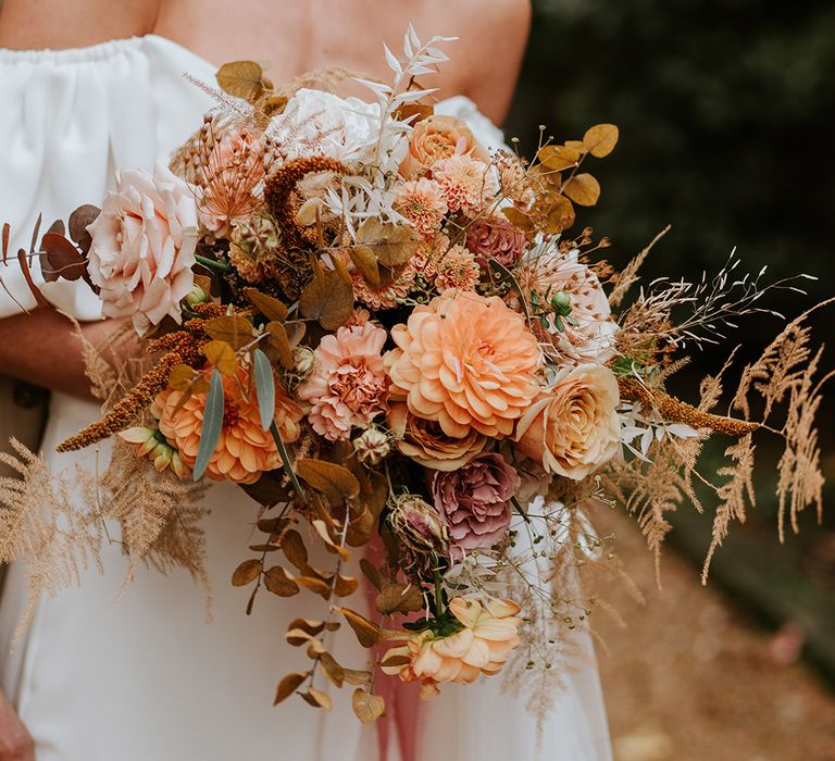 Toffee, beige and rust coloured wedding bouquet wirh fresh and dried flowers