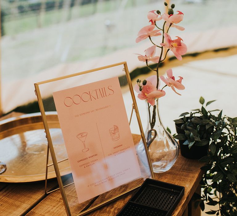 Pink and red cocktail menu for wedding drinks 