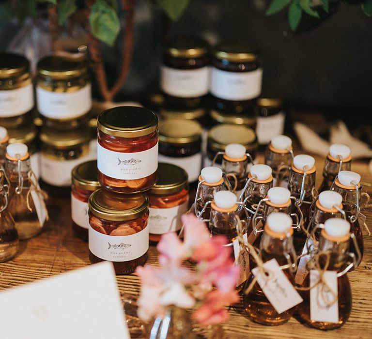 Homemade unique wedding favour ideas with homemade jams, rhubarb vodka, beech leaf gin 