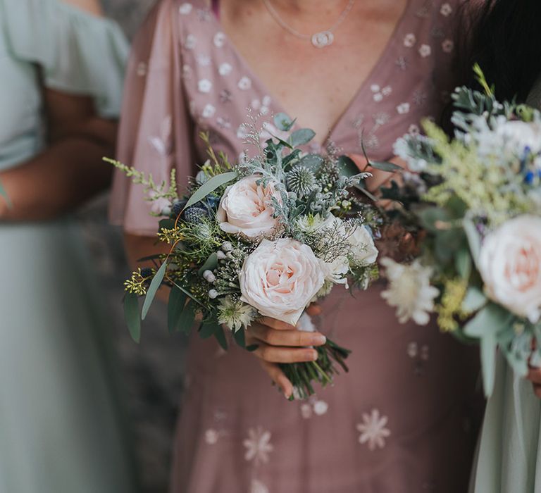 small bridesmaid bouquet with pink roses and thistles 