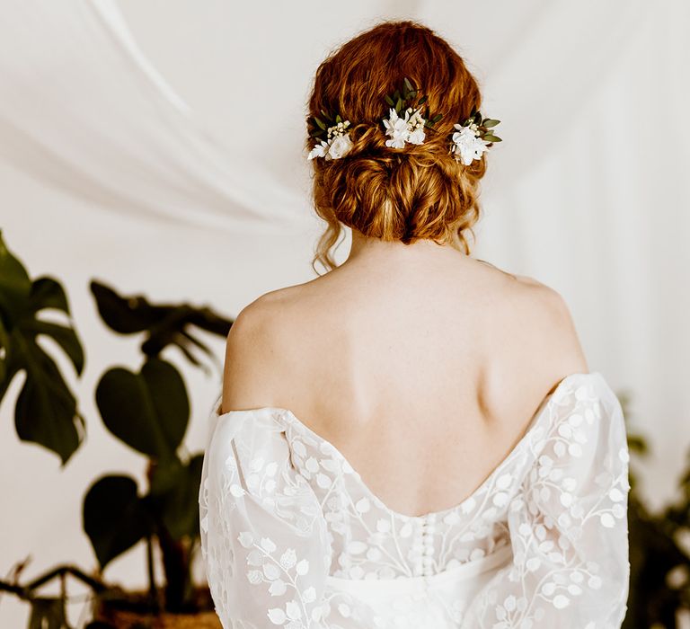 loosely pinned wedding hairstyle with Luna and wild preserved flower accessories 