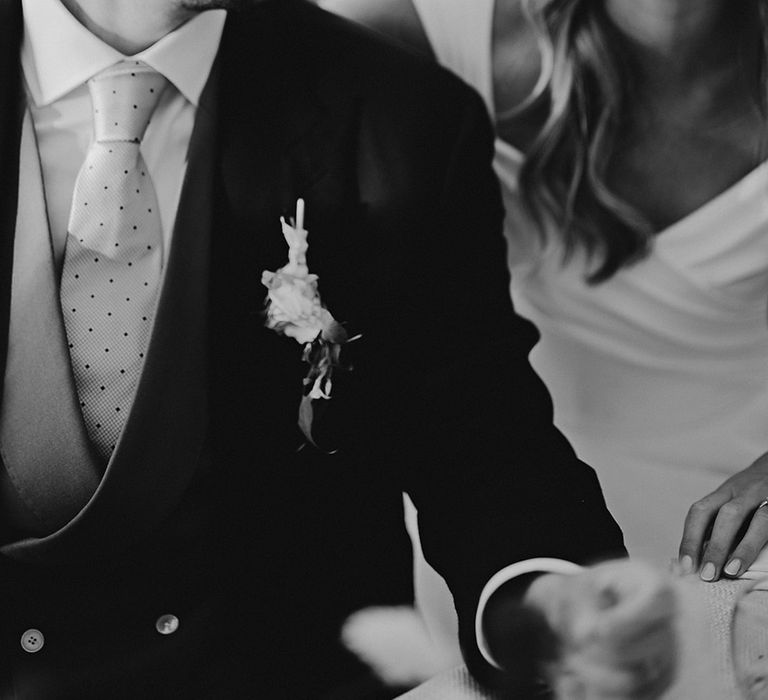 bride and groom smiling during the marquee wedding reception speeches 