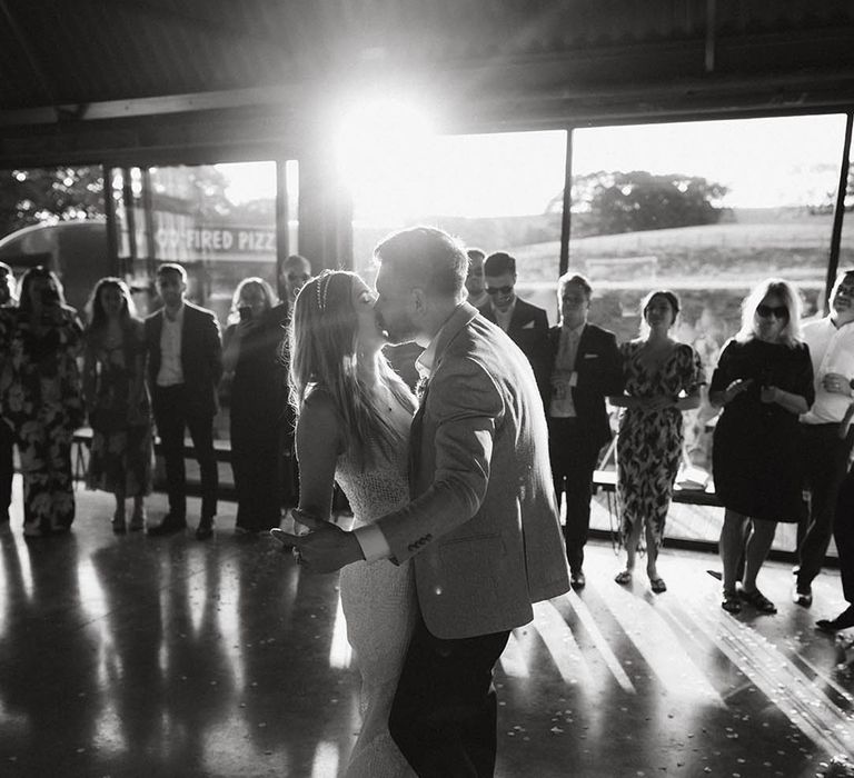 First dance for bride and groom at their industrial wedding venue dancing to The Weeknd 