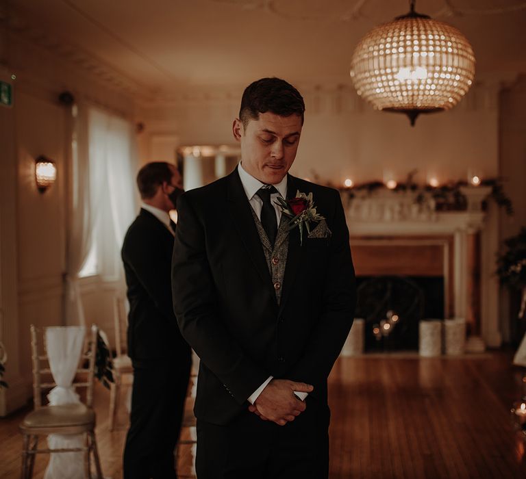 Groom awaits bride's arrival