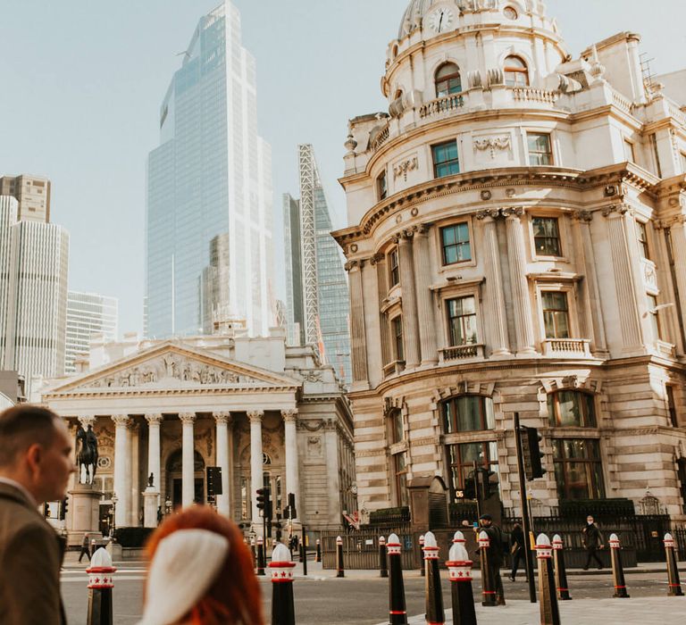 Bride and groom exploring the city for their London elopement wedding 