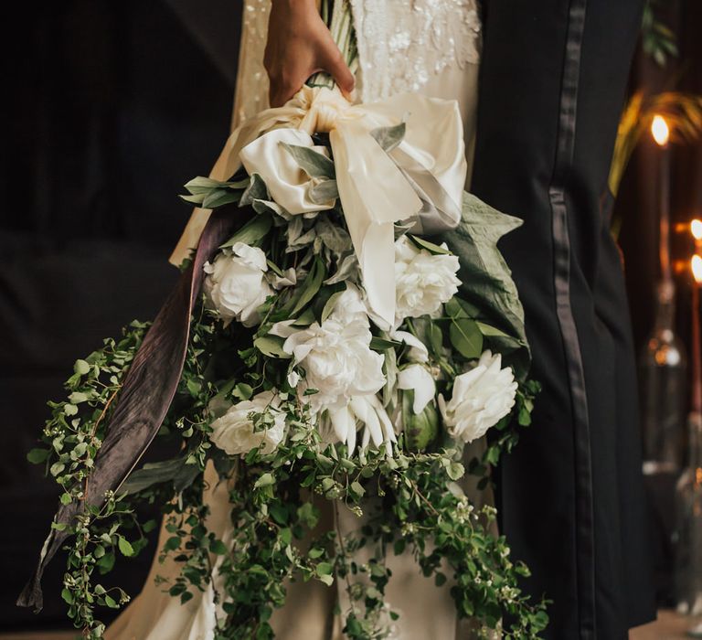 White and green hand tied wedding bouquet with ribbon 