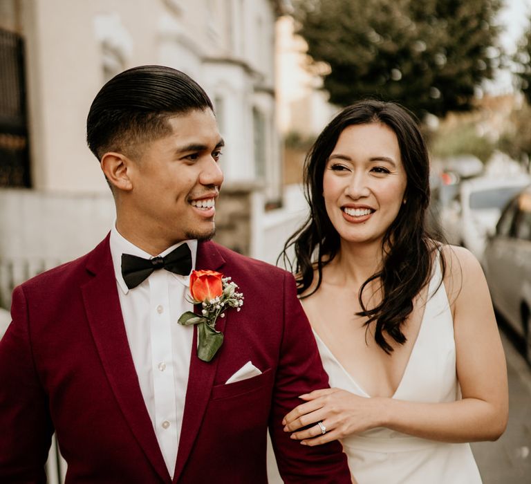 Stylish bride and groom walking around Clapton with their photographer Elena Popa Photography