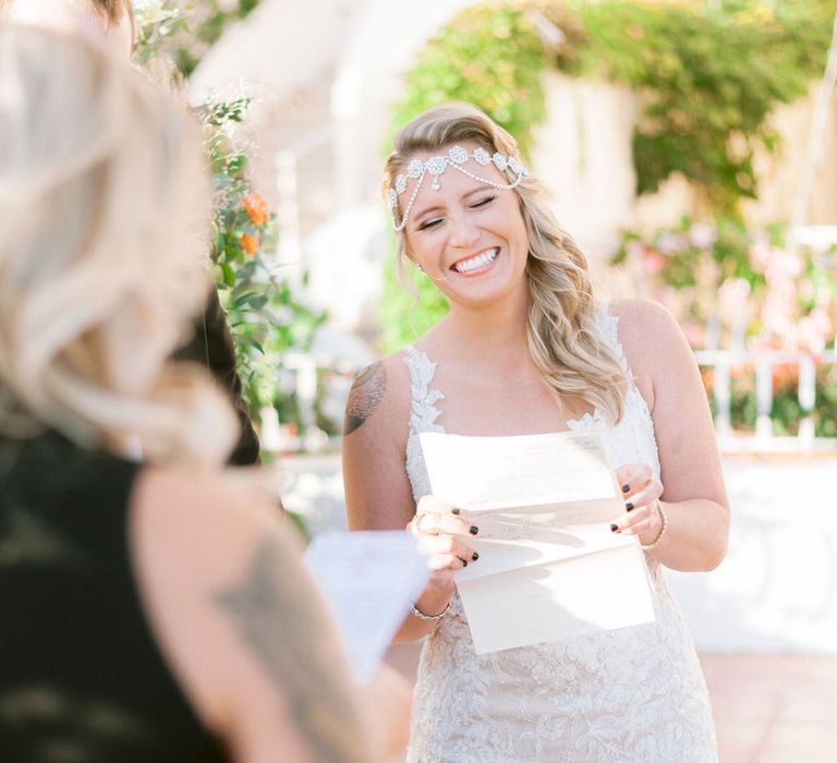 The brides couldn't help laughing while reading out their vows