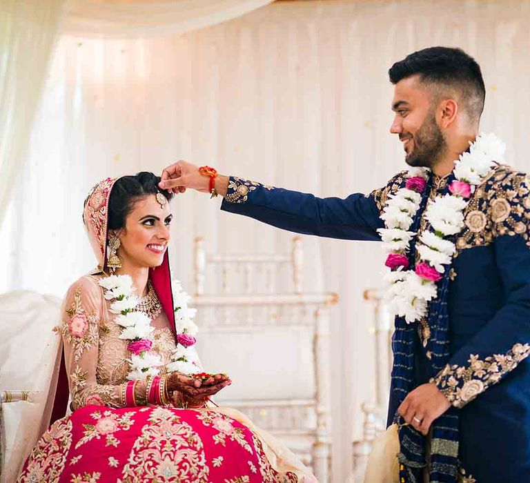 Bride and groom during ceremony at Hindu fusion wedding