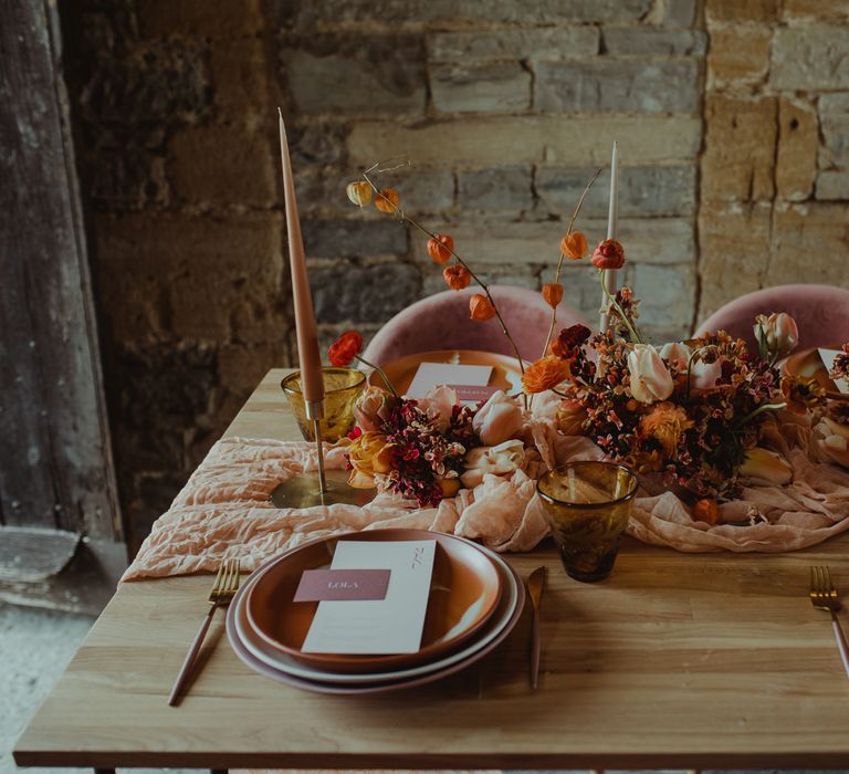 Blush and orange wedding table decor at Almonry Barn Somerset