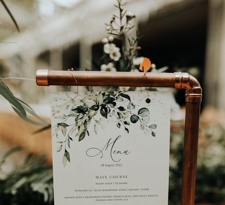 DIY copper table signs with foliage decor