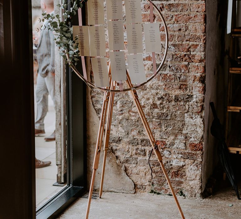 Hoop wedding table plan on an easel 