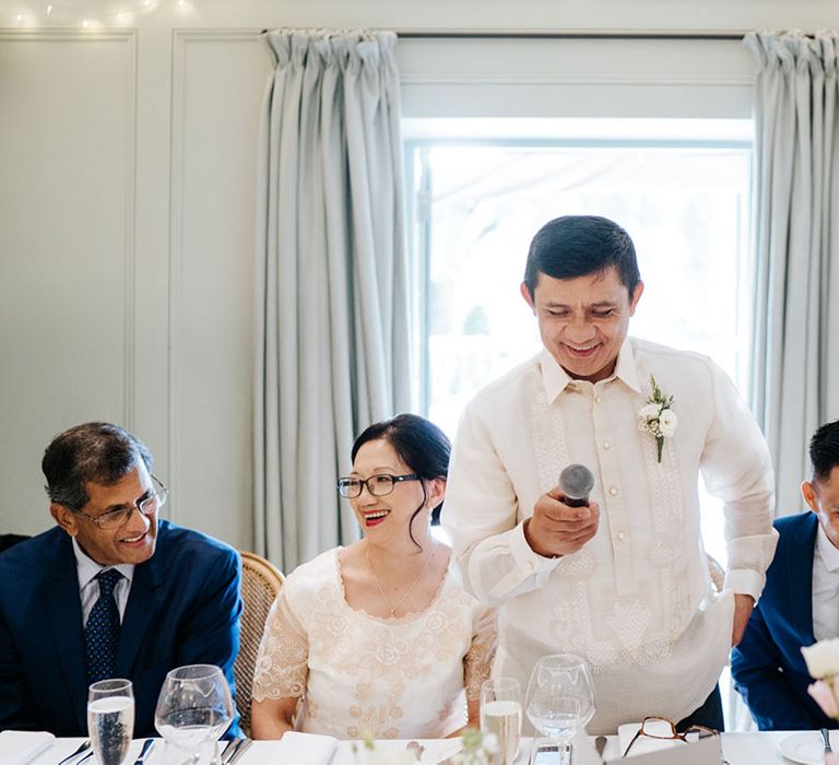 Father of the bride wedding speech in a cream with gold embroidery patterned shirt 