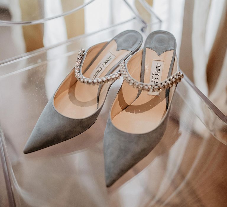 Grey suede Jimmy Choo wedding shoes complete with embellishment to the strap