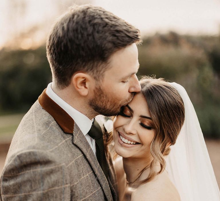 Bride and groom at The Old Kent Barn wedding venue