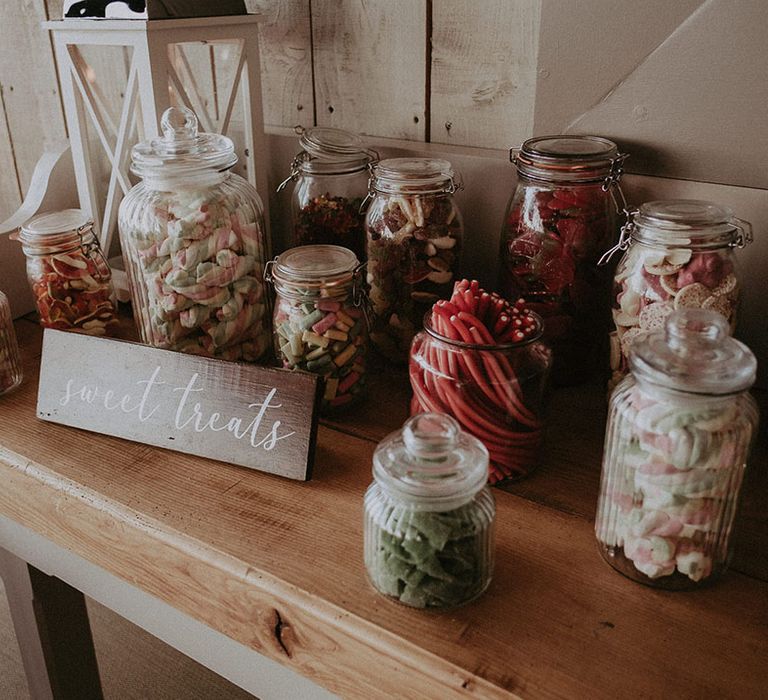 DIY pick 'n' mix station made by the bridal party and family including popular and old-fashioned sweets