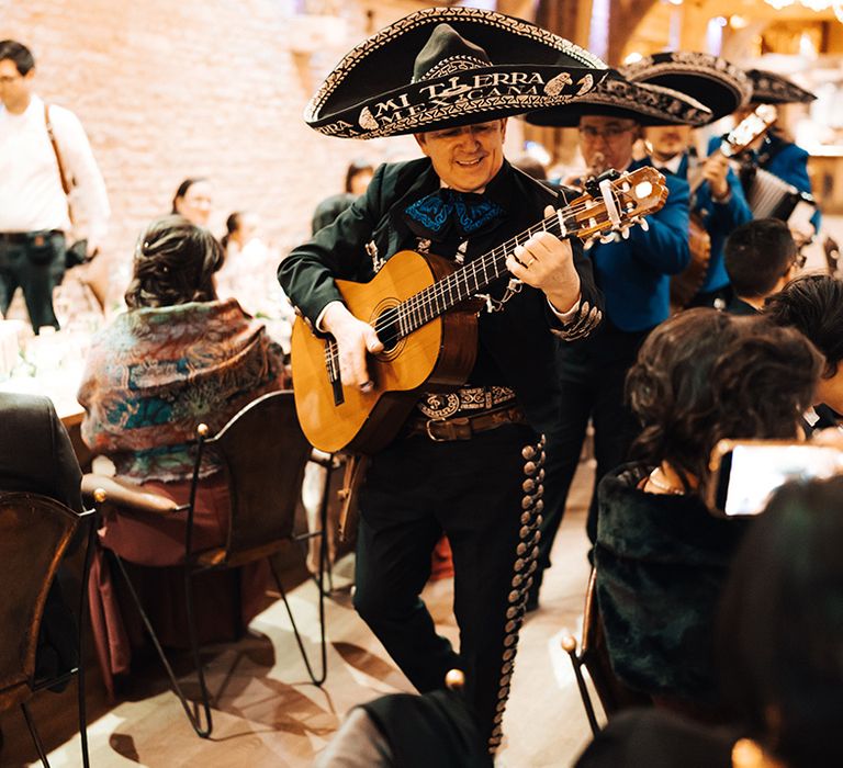 Roaming mariachi band wedding entertainment in blue uniforms